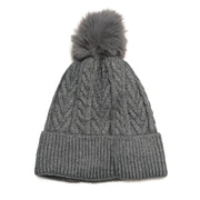 Grey cable knit beanie with matching faux fur pompom.
