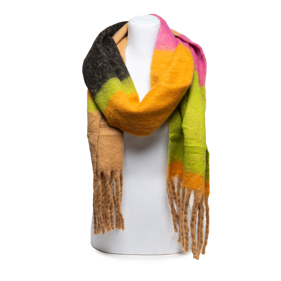 A felted color block scarf with a thick tasseled fringe. The color blocks are a mix of orange, chartreuse, pink, black, and tan.