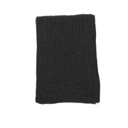 A grey knit scarf with knit border.