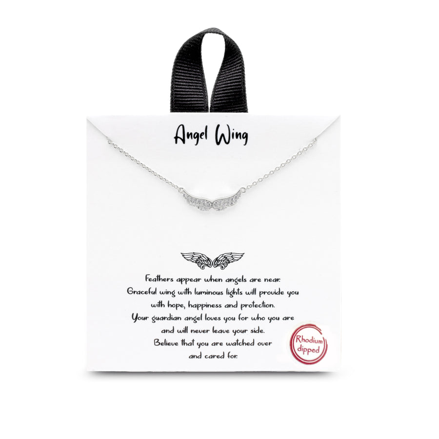 A silver necklace of a pair of angel wings with pavé rhinestones. The necklace is on a card with text.