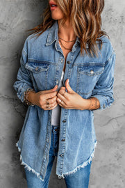 A blue, distressed denim shirt jacket with a raw hem.