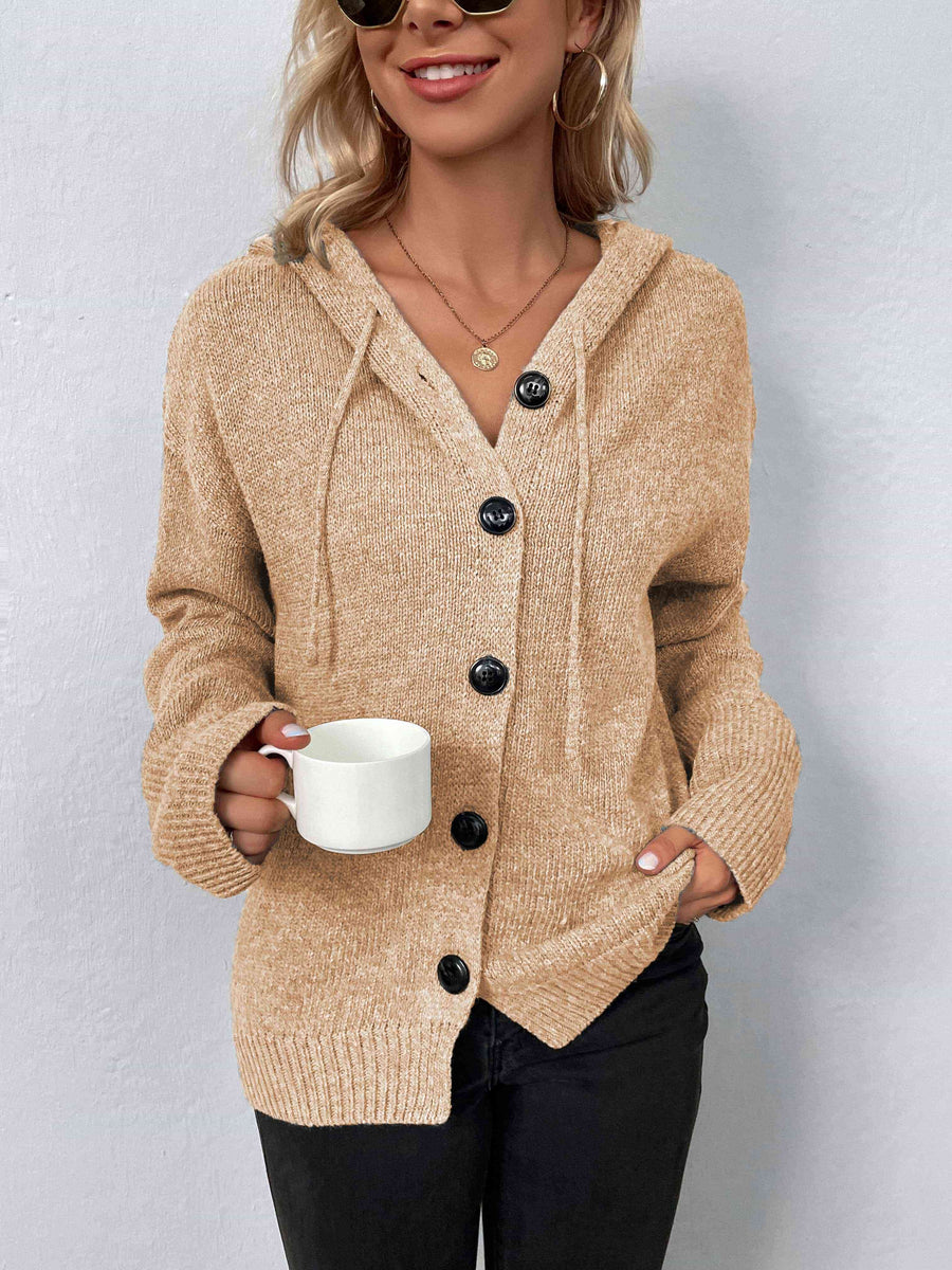 A marled caramel, knit sweater with a drawstring hood and large black buttons.