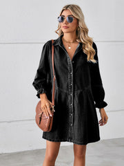 A midi length, button down, black denim dress with ruched sleeve cuffs.