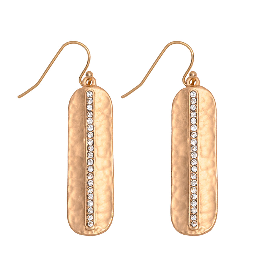 Matte gold capsule shaped Pave Drop Earring with hammered finish centered with row of imitation diamonds on white background