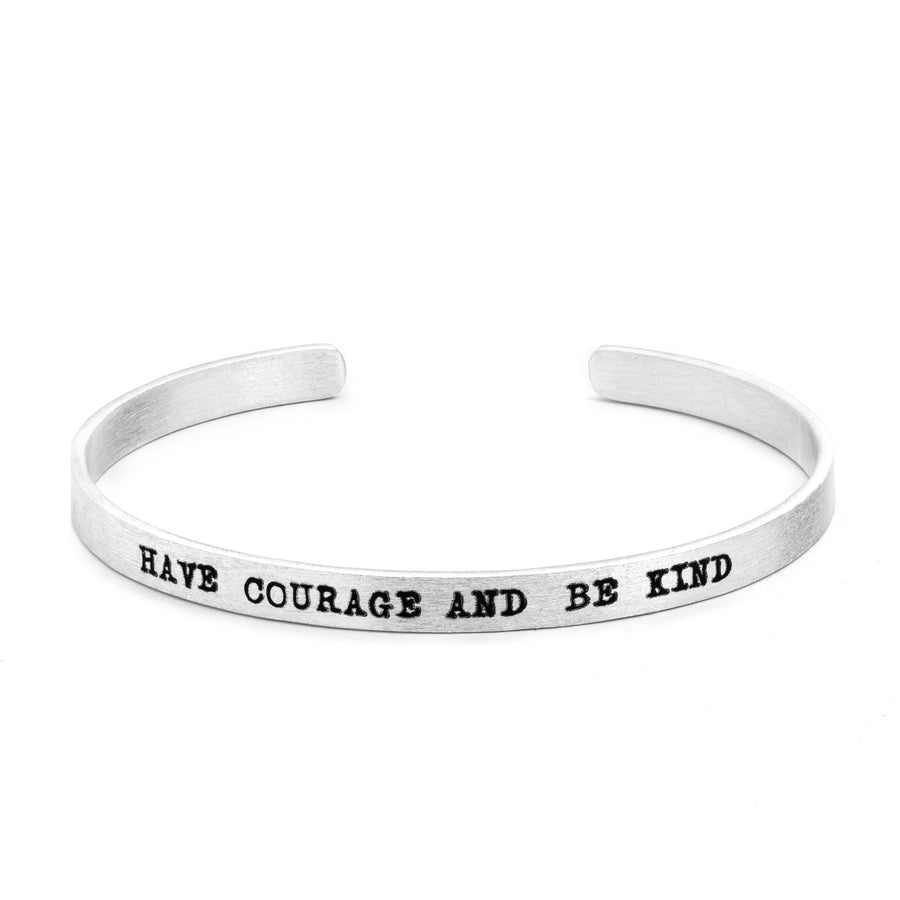 Sentimental Silver Fearless Slim Cuff Bracelet in matte silver with "Have Courage And Be Kind" text inscribed in black lettering on white background