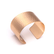 Adjustable wide wrist Hammered Cuff Bracelet in matte gold on white background