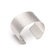 Adjustable wide wrist Hammered Cuff Bracelet in matte silver on white background